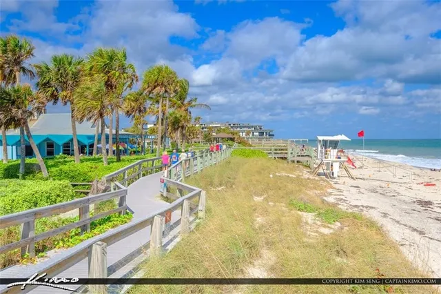 a view of swimming pool with a patio