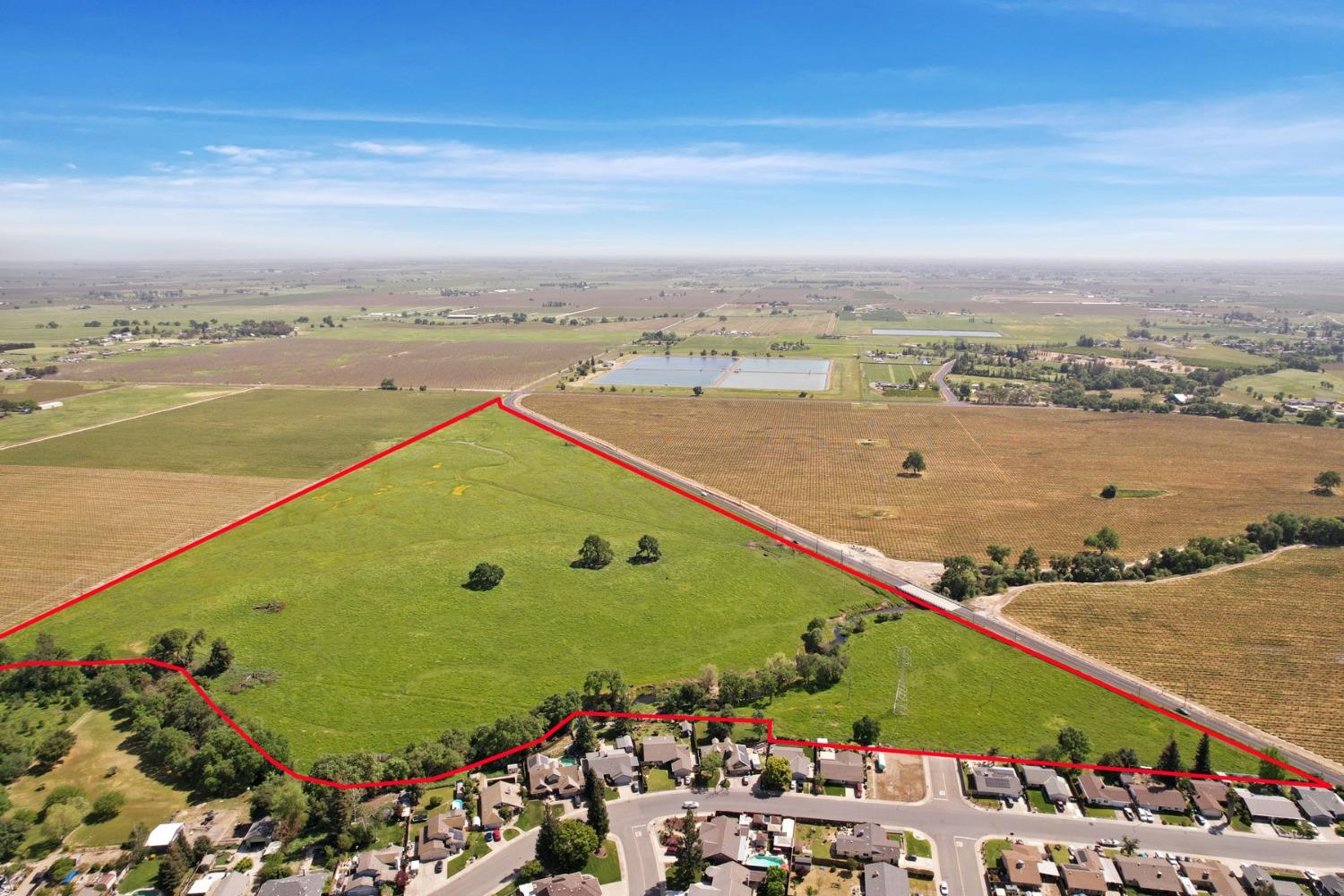 18400 North Tully Road Lodi, CA 95240 - Photo 4 of 23 an aerial view of ocean and residential houses with outdoor space