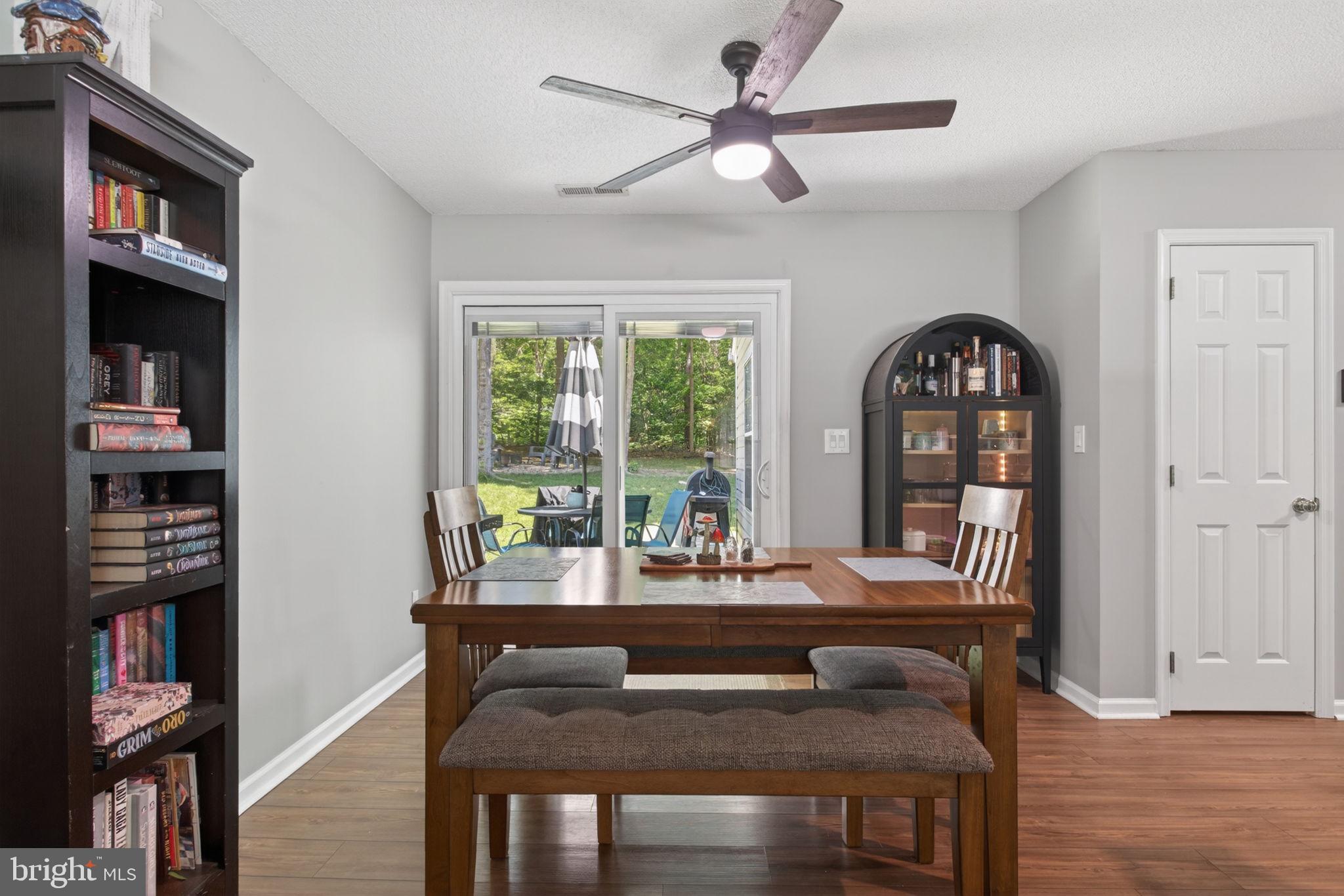 3917 Longhill Station Road Williamsburg, VA 23188 - Photo 9 of 29 Bright dining area with outdoor view.