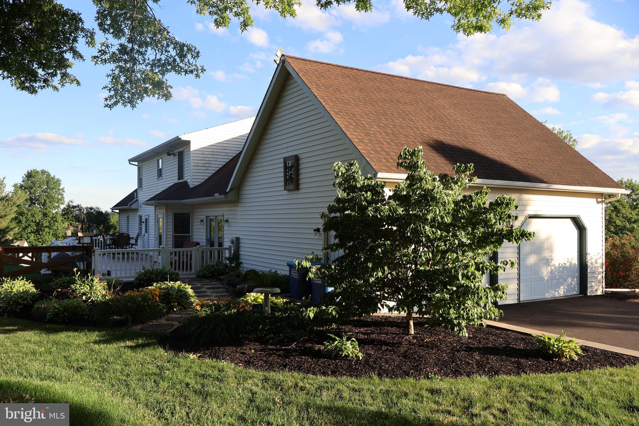 509 Buchland Road Narvon, PA 17555 - Photo 66 of 94 a front view of a house with a garden