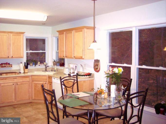 93 Tom Jenkins Road Fredericksburg, VA 22406 - Photo 5 of 13 Kitchen floor is 16 inch cermaic tile