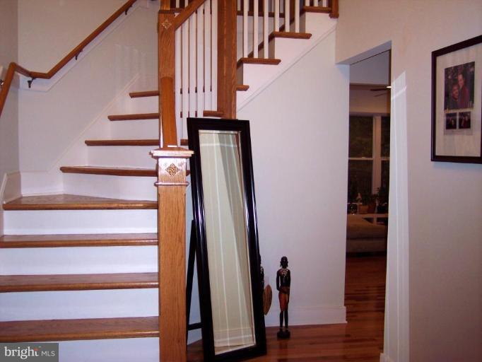 93 Tom Jenkins Road Fredericksburg, VA 22406 - Photo 6 of 13 Curved staircase adds elegance