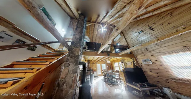 a view of a bedroom with washer and dryer