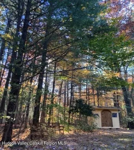 a view of ocean view with large trees