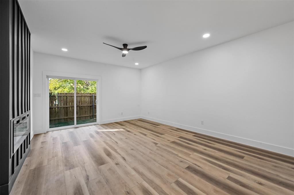 2413 Easley Street Dallas, TX 75215 - Photo 14 of 24 an empty room with windows