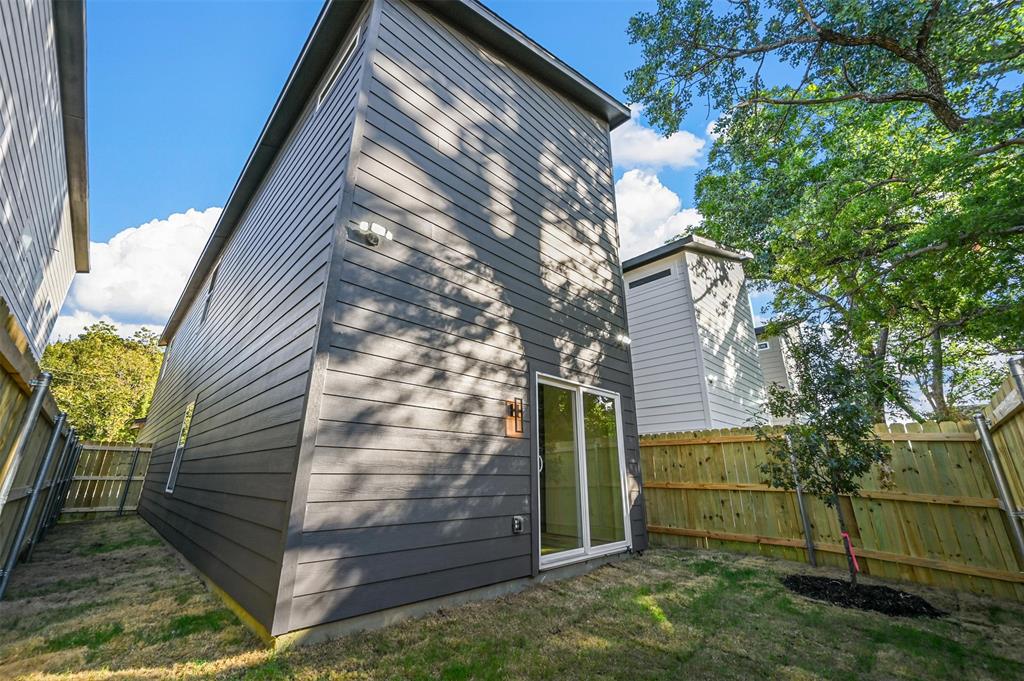 2413 Easley Street Dallas, TX 75215 - Photo 24 of 24 a view of a house with a yard