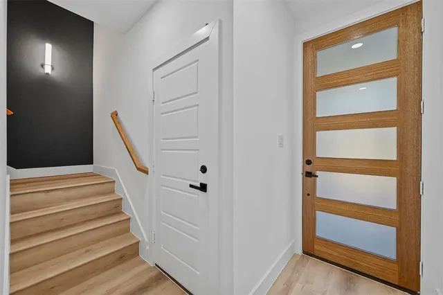 a view of an entryway with staircase