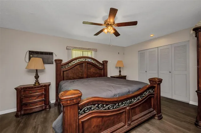 a bed room with a bed and a dresser