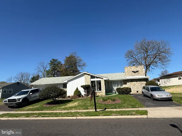 a car parked in front of a house