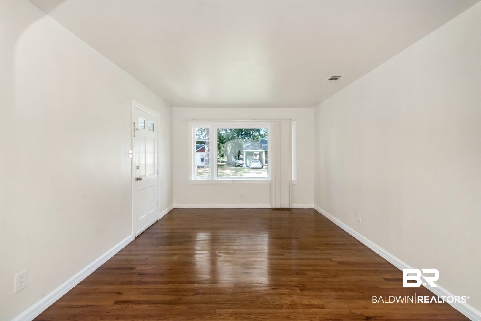 1477 Fairfield Street Mobile, AL 36606 - Photo 10 of 34 Entryway with dark wood-style floors