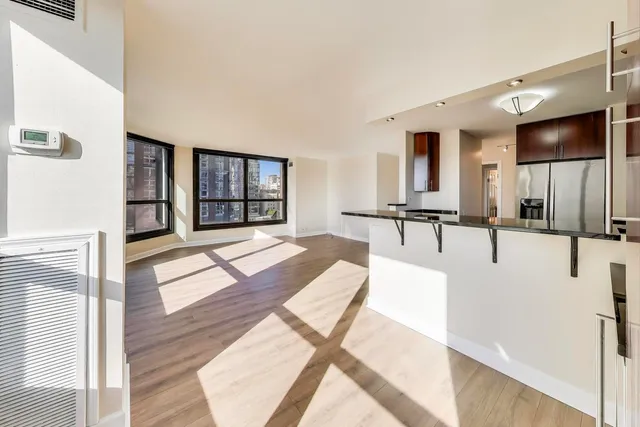 a lobby with furniture and window