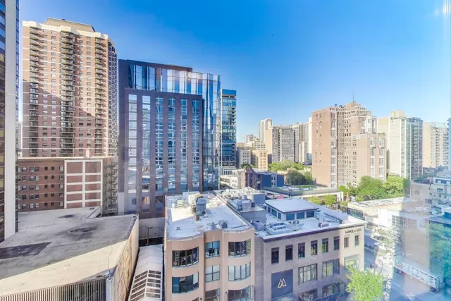 a large building with a city view