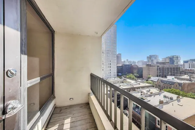 a view of balcony with city