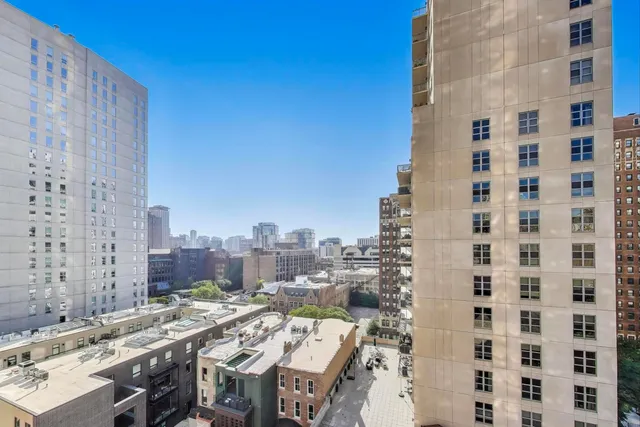 a city view with tall buildings