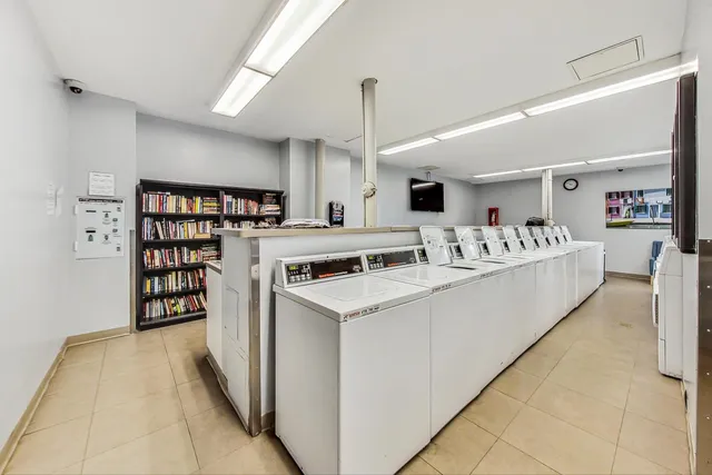 a view of living room with furniture and window