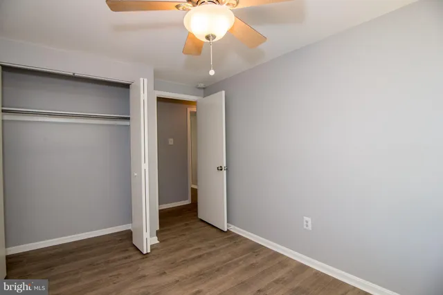 a bathroom with a toilet a sink and bathtub