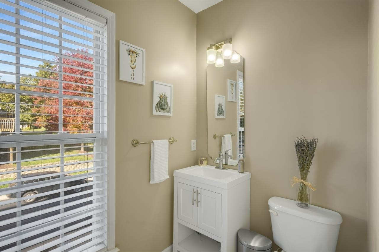 7106 Proctor Hill Drive Raleigh, NC 27613 - Photo 16 of 29 2nd floor half bath