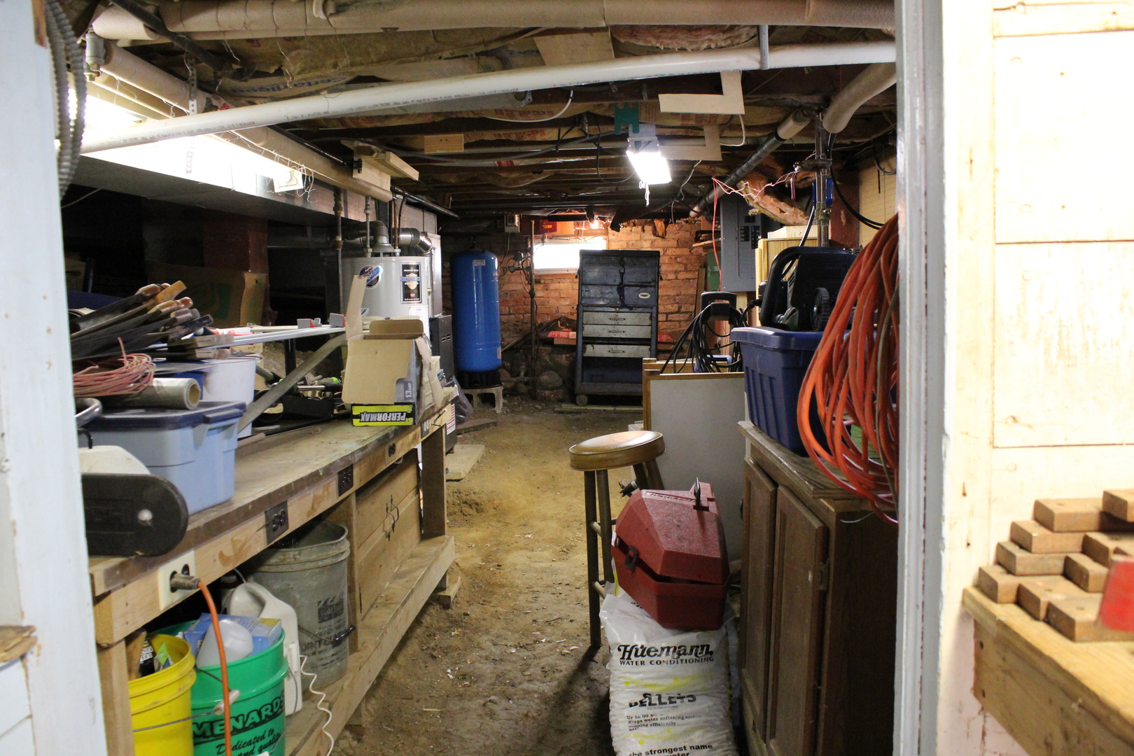 8409 Balder Drive Cary, IL 60013 - Photo 16 of 23 a view of walk in closet with clothes and shoes