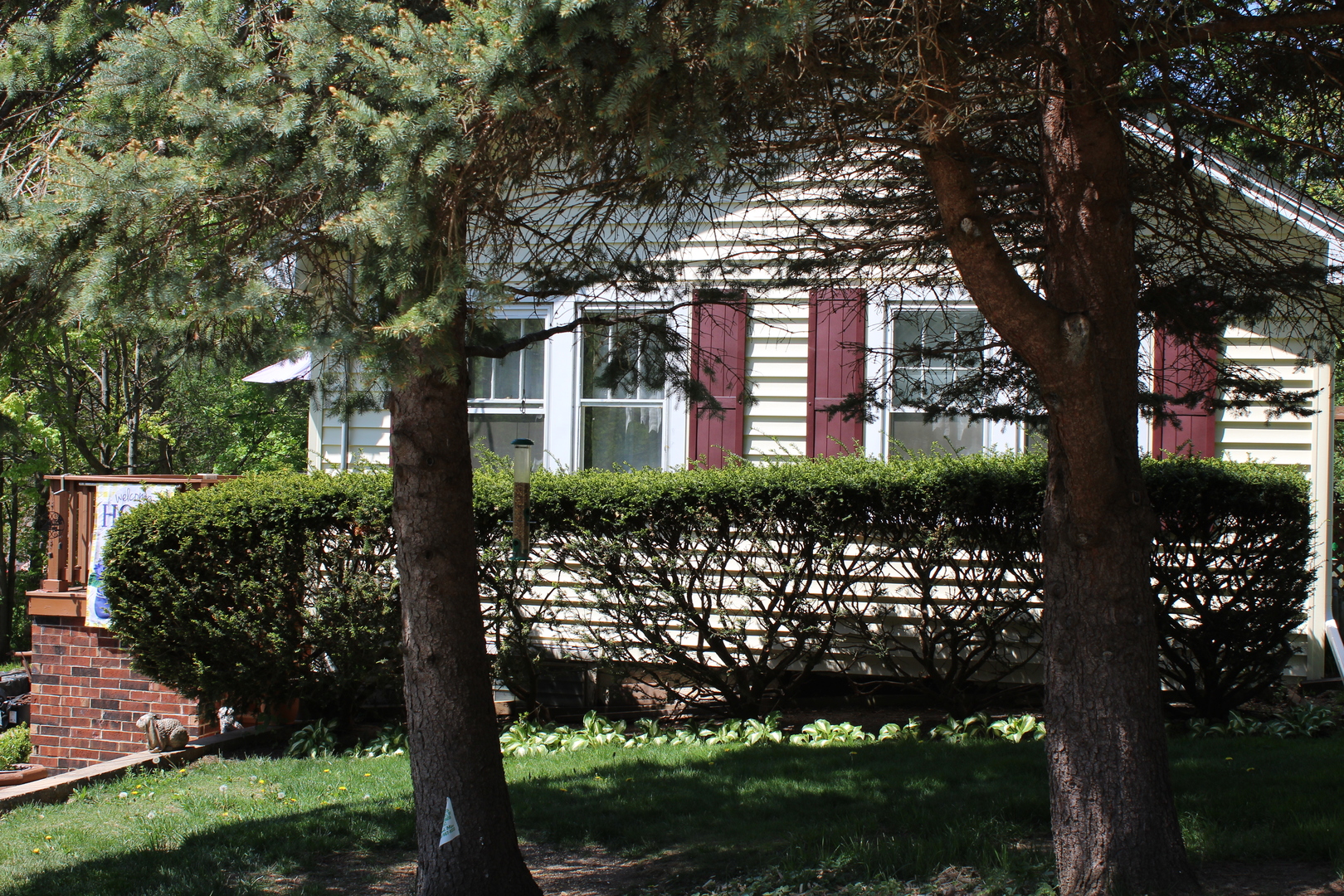 8409 Balder Drive Cary, IL 60013 - Photo 2 of 23 a view of a house with a tree bath and a yard
