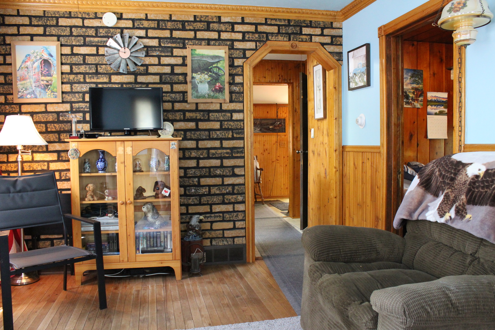 8409 Balder Drive Cary, IL 60013 - Photo 7 of 23 a view of a living room filled with furniture and wooden floor