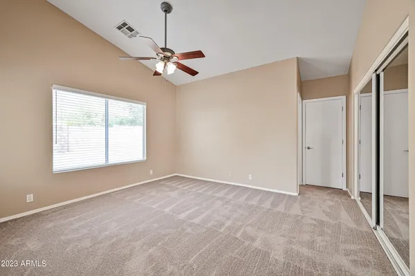 a view of an empty room with a window