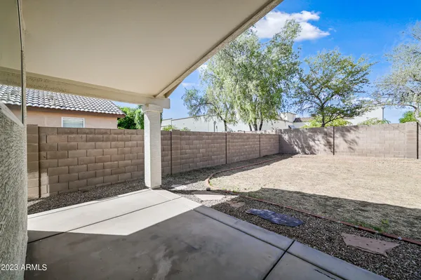 a house view with a backyard space