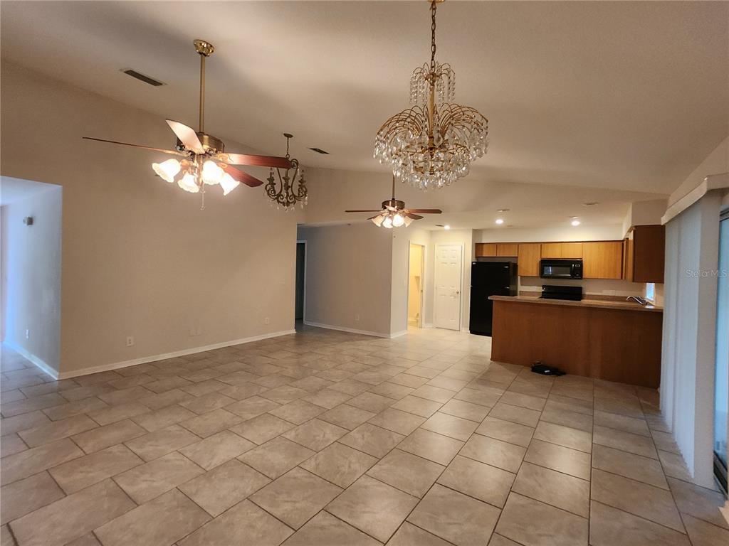6521 East Grayson Street Inverness, FL 34452 - Photo 4 of 16 a view of a kitchen with a sink and cabinets