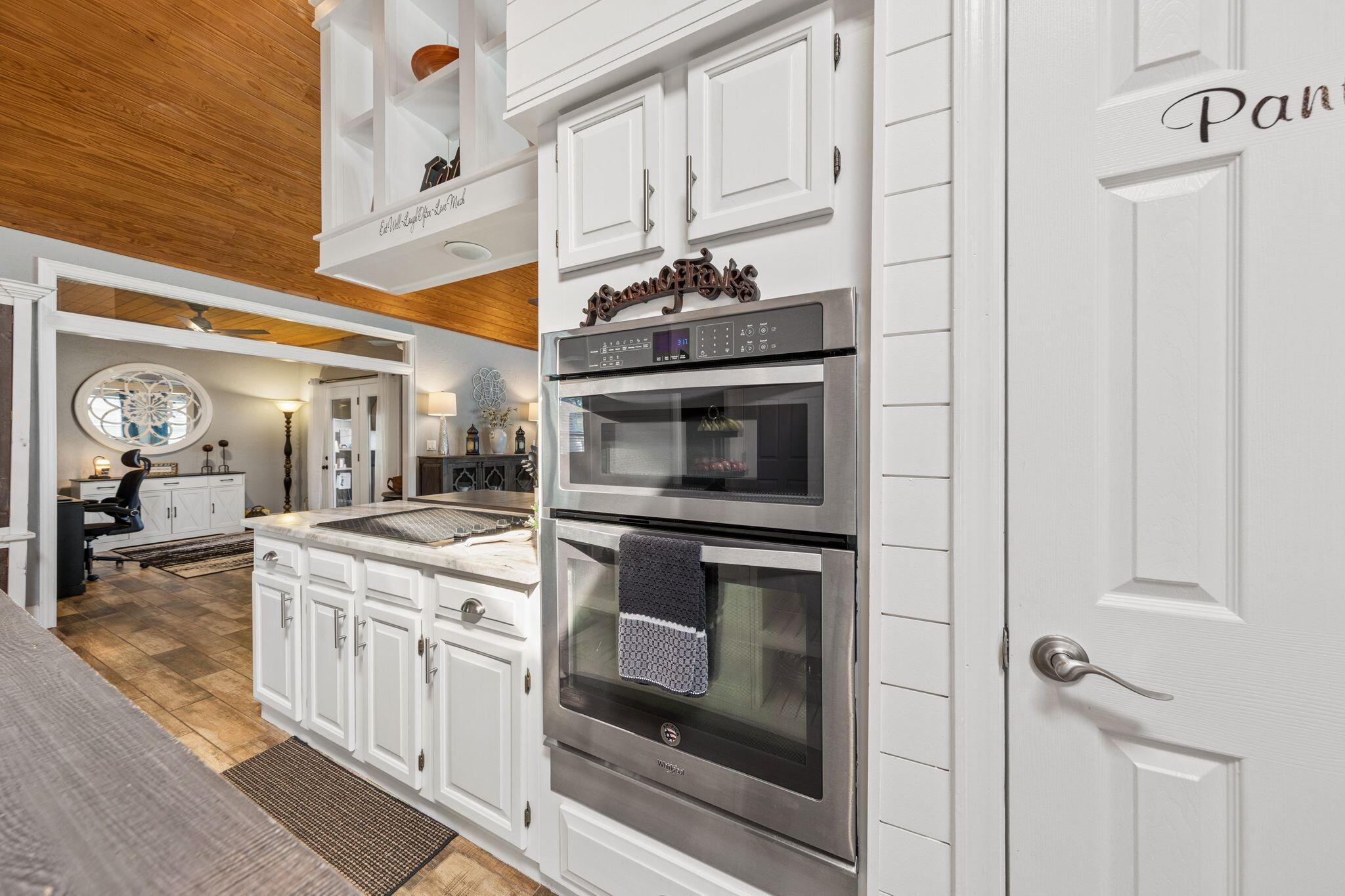 11 Hampton Circle Niceville, FL 32578 - Photo 19 of 79 a kitchen with stainless steel appliances granite countertop a stove and a sink