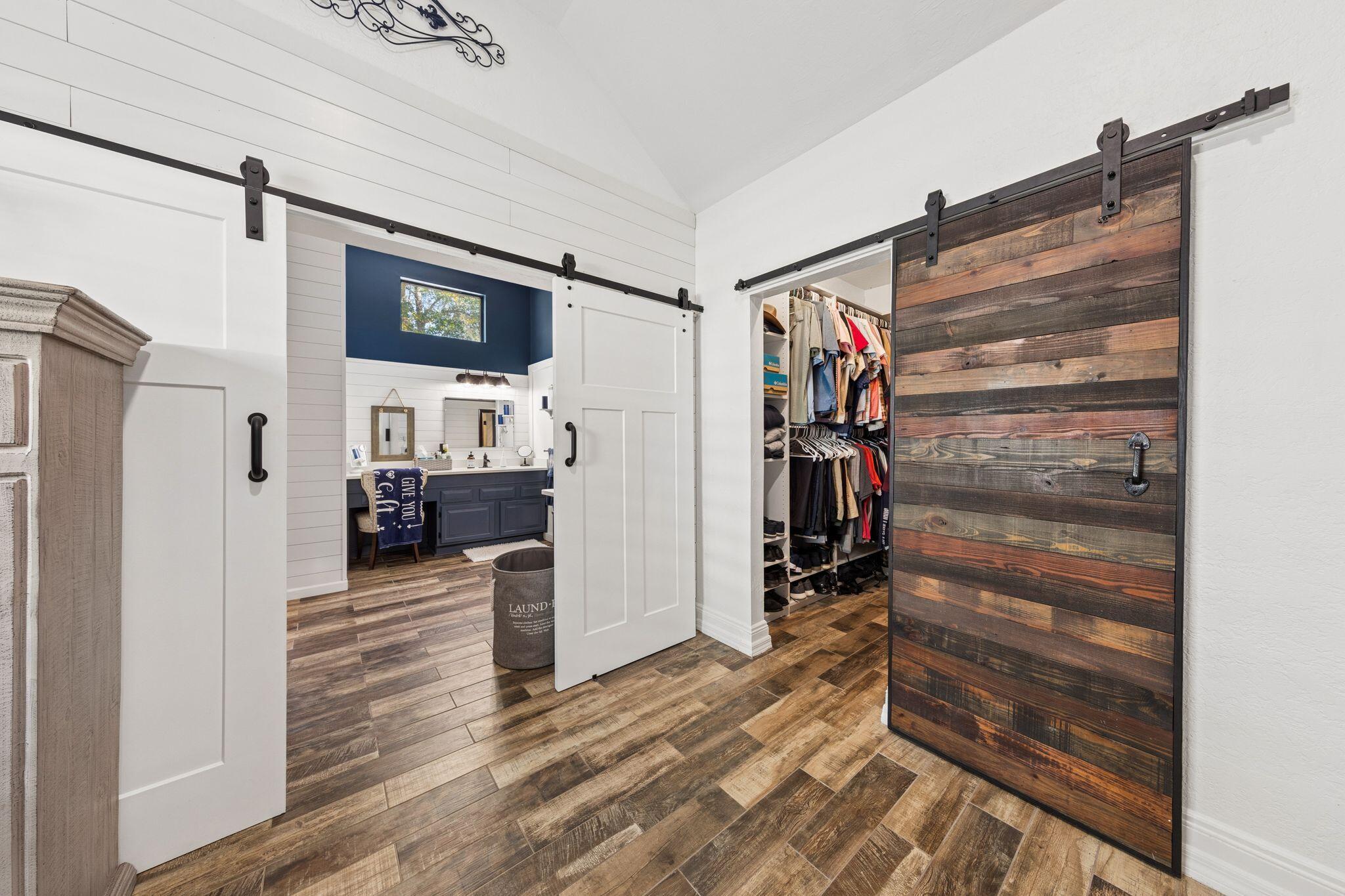 11 Hampton Circle Niceville, FL 32578 - Photo 28 of 79 a view of walk in closet with clothes and shoes