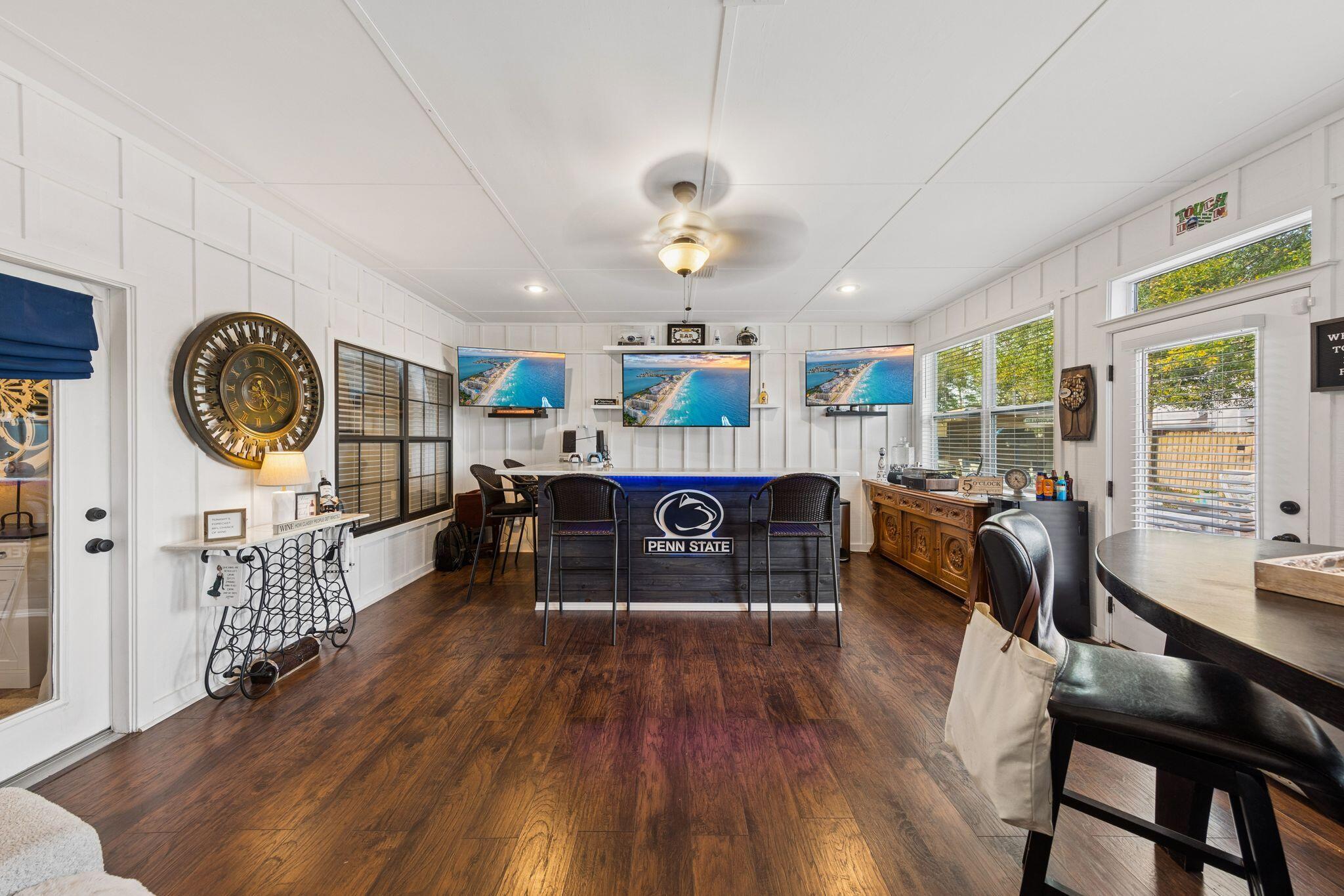 11 Hampton Circle Niceville, FL 32578 - Photo 35 of 79 a living room with furniture and a wooden floor