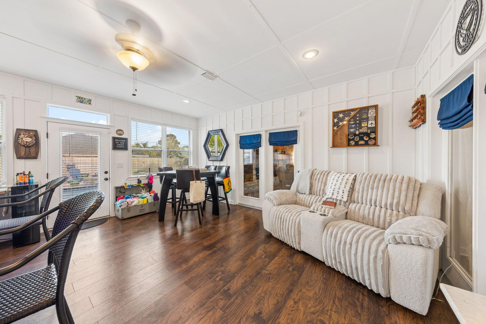 11 Hampton Circle Niceville, FL 32578 - Photo 37 of 79 a living room with furniture and wooden floor