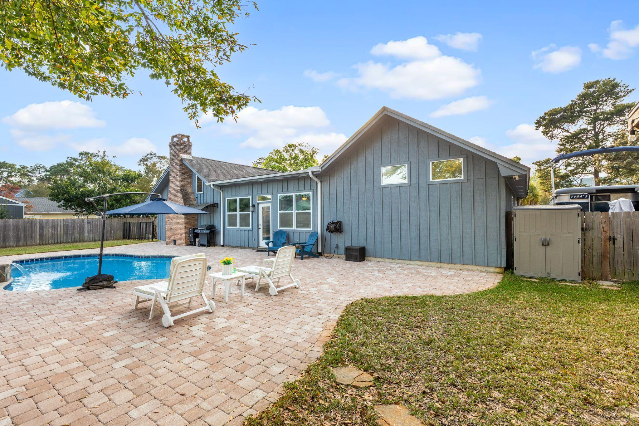 11 Hampton Circle Niceville, FL 32578 - Photo 47 of 79 a view of house with backyard and seating space