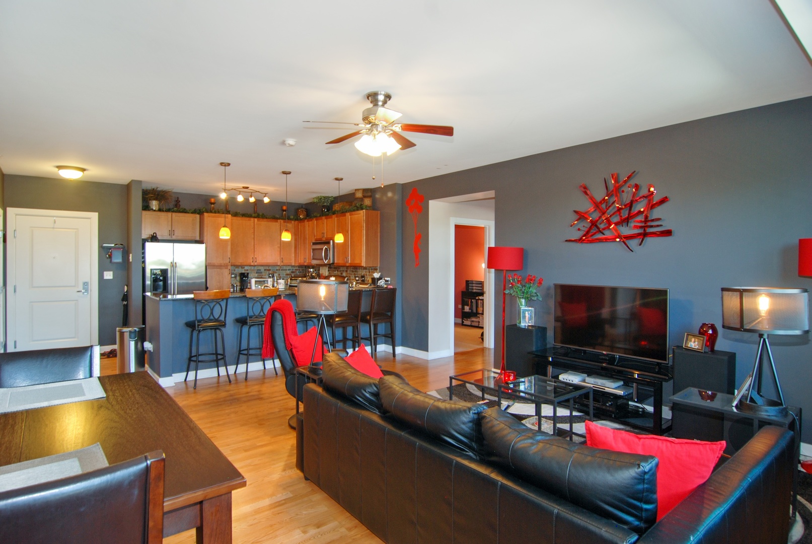 1905 South Wolf Road, Unit 605 Hillside, IL 60162 - Photo 12 of 31 a living room with furniture and a flat screen tv