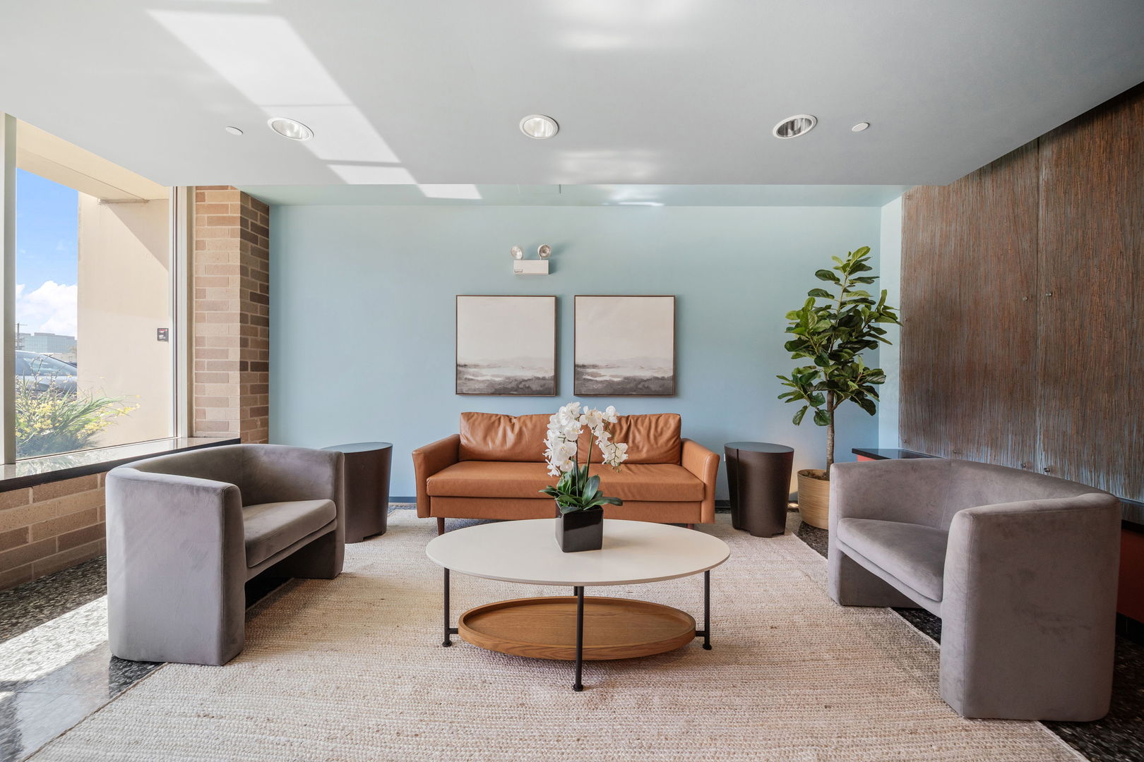 1905 South Wolf Road, Unit 605 Hillside, IL 60162 - Photo 2 of 31 a living room with furniture and a potted plant