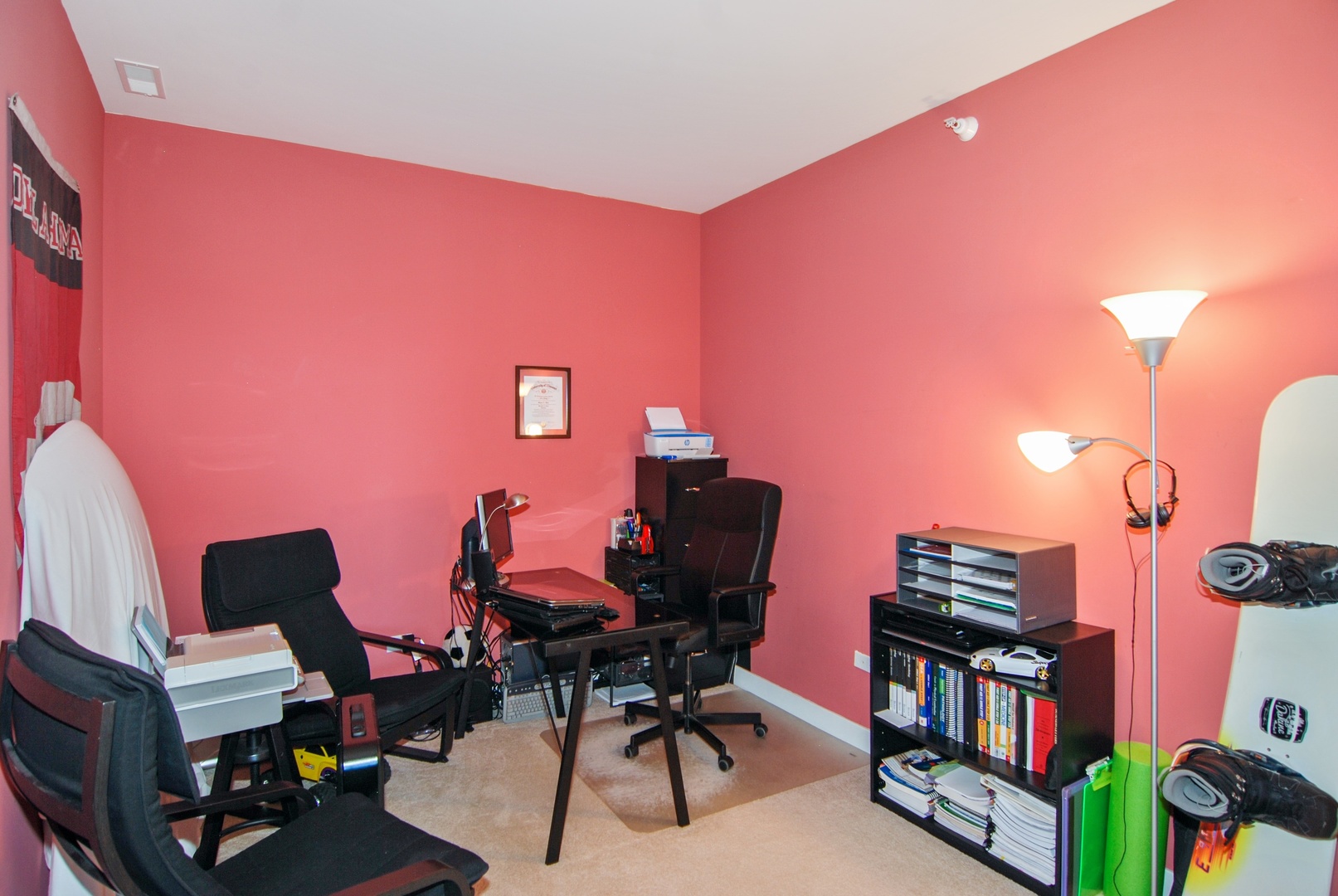 1905 South Wolf Road, Unit 605 Hillside, IL 60162 - Photo 23 of 31 a workspace with furniture and screen on a bookshelf