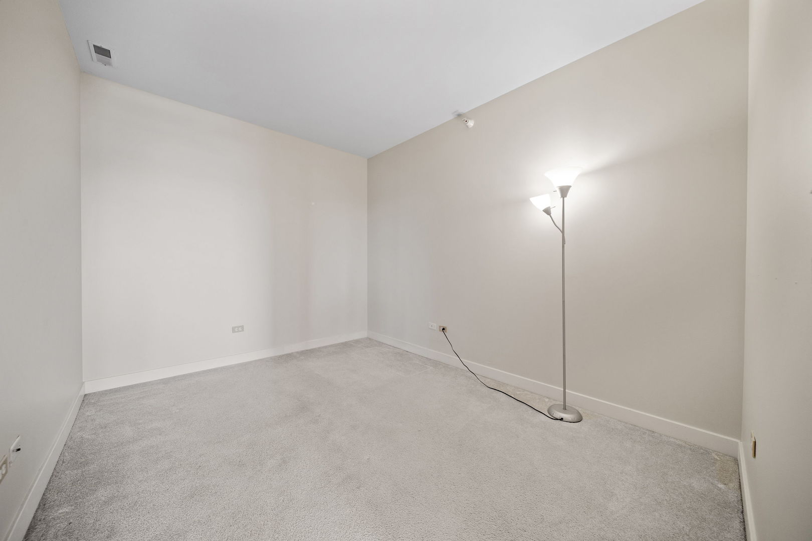 1905 South Wolf Road, Unit 605 Hillside, IL 60162 - Photo 24 of 31 a view of an empty room with a fan