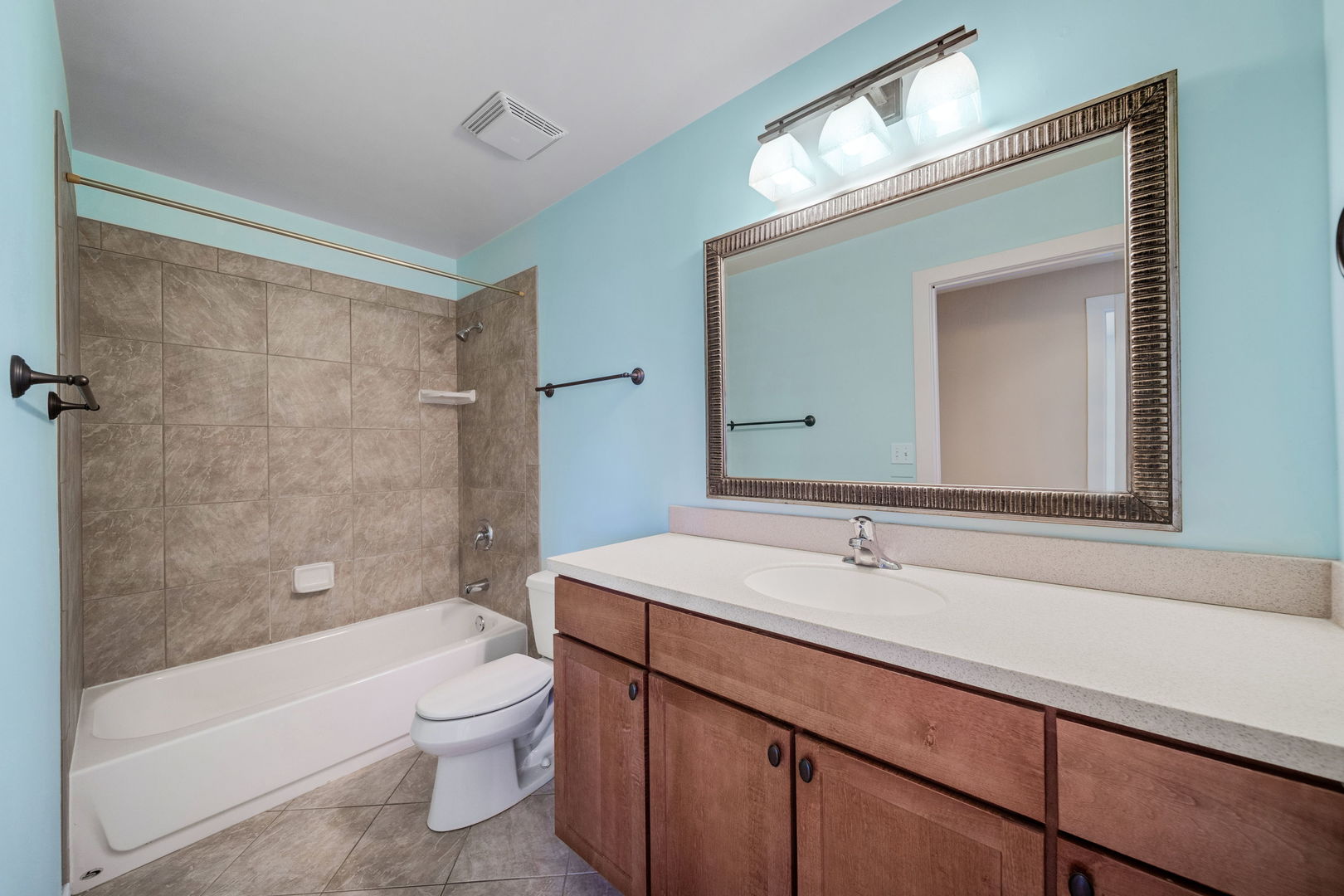 1905 South Wolf Road, Unit 605 Hillside, IL 60162 - Photo 28 of 31 a bathroom with a sink a toilet and shower