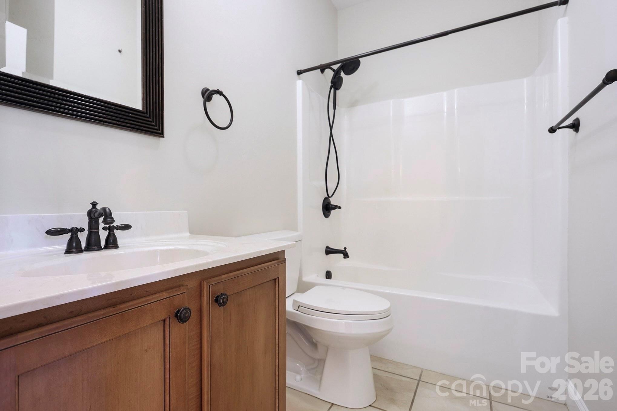 170 St James Way Salisbury, NC 28147 - Photo 20 of 27 a bathroom with a sink a toilet and shower