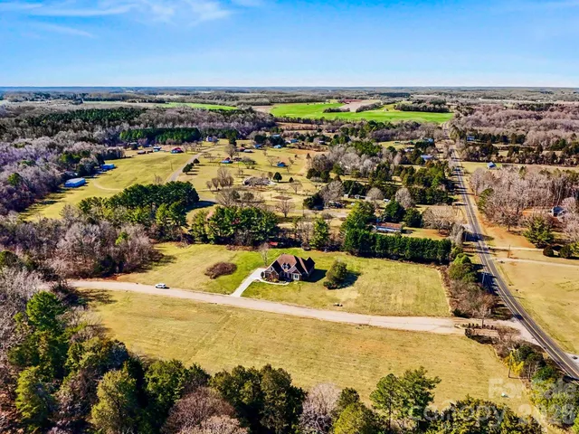 a view of a swimming pool with an ocean view
