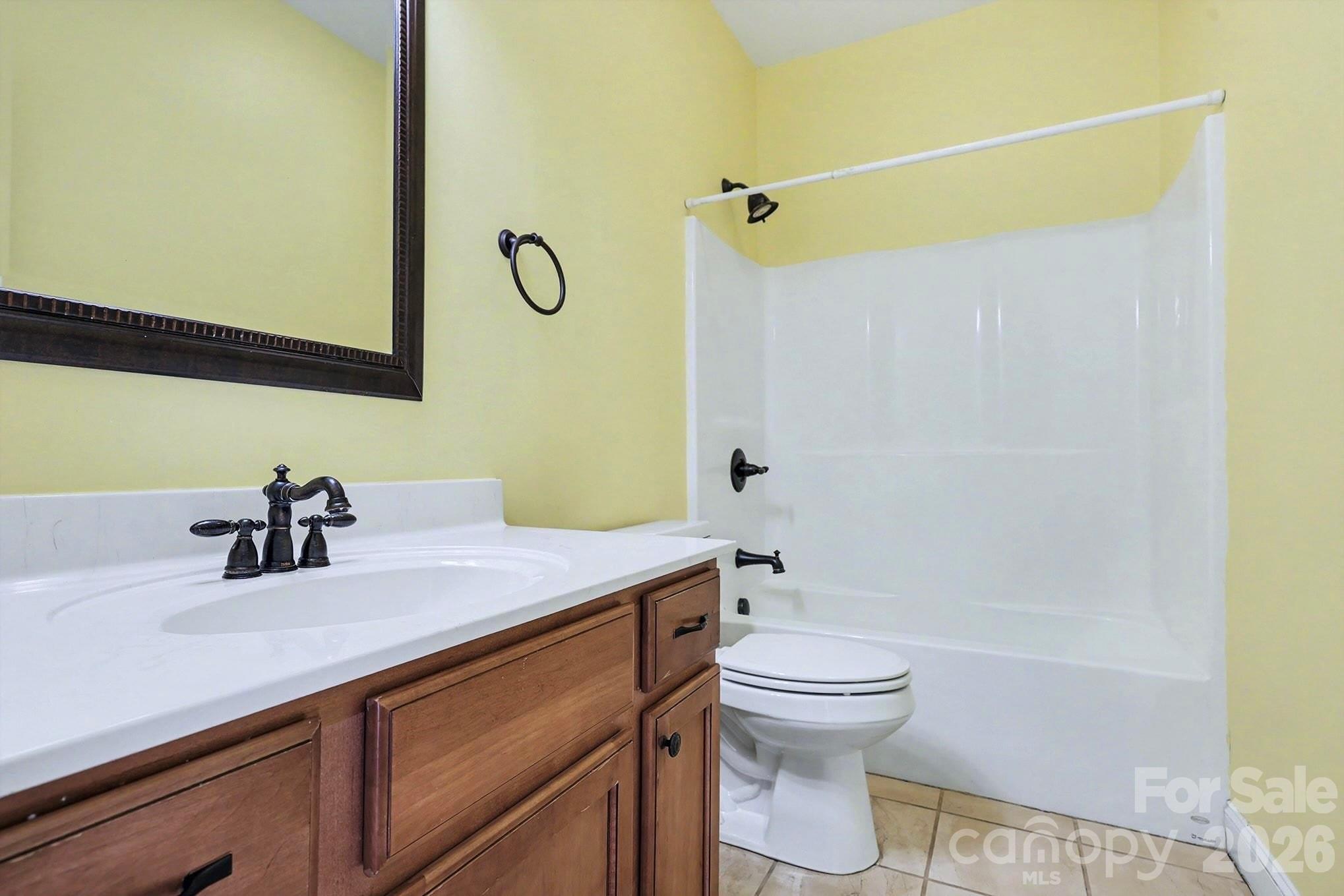 170 St James Way Salisbury, NC 28147 - Photo 22 of 27 a bathroom with a sink a toilet and shower