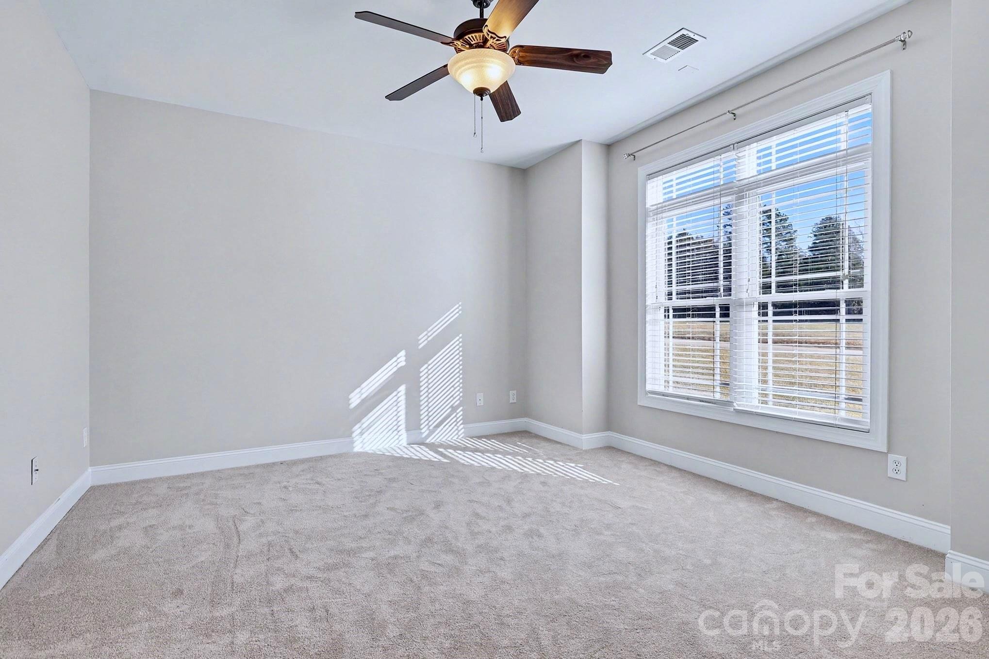 170 St James Way Salisbury, NC 28147 - Photo 23 of 27 a view of an empty room with a window
