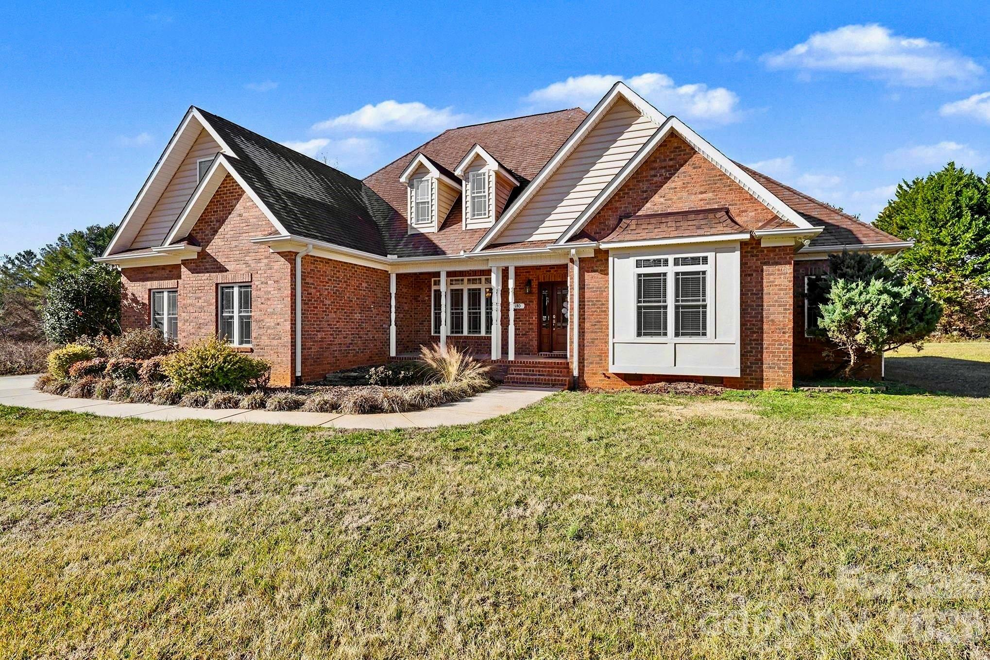 170 St James Way Salisbury, NC 28147 - Photo 25 of 27 a front view of a house with a yard