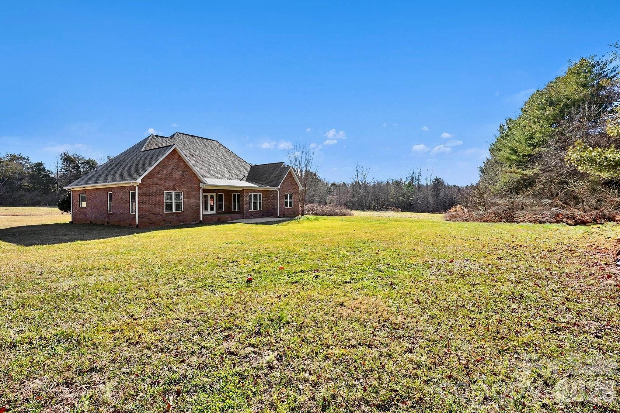 170 St James Way Salisbury, NC 28147 - Photo 26 of 27 a view of swimming pool with an outdoor space and seating area