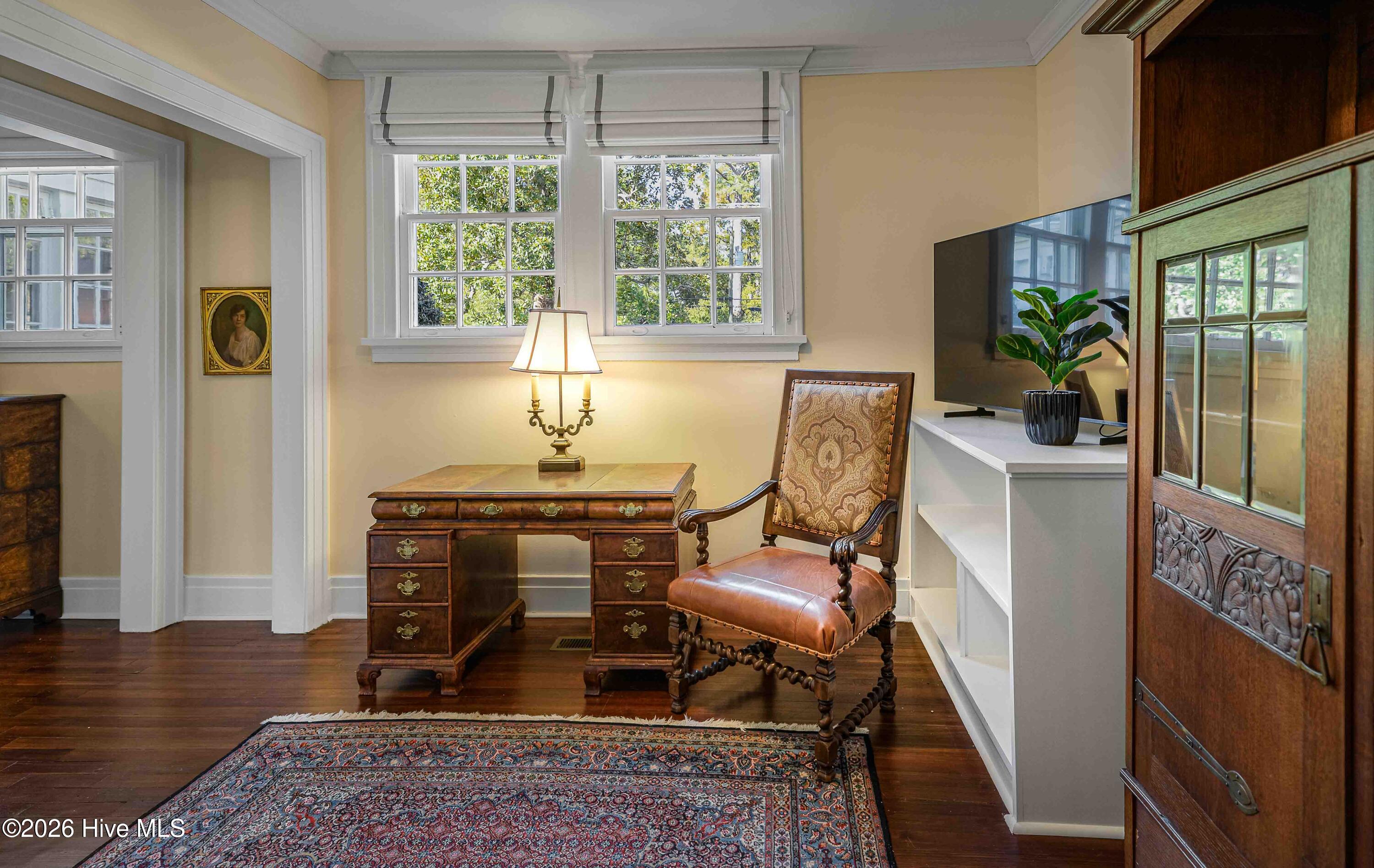 12 Barrett Road East Pinehurst, NC 28374 - Photo 31 of 77 Main floor bedroom suite with private wing with a large living area and full bathroom.