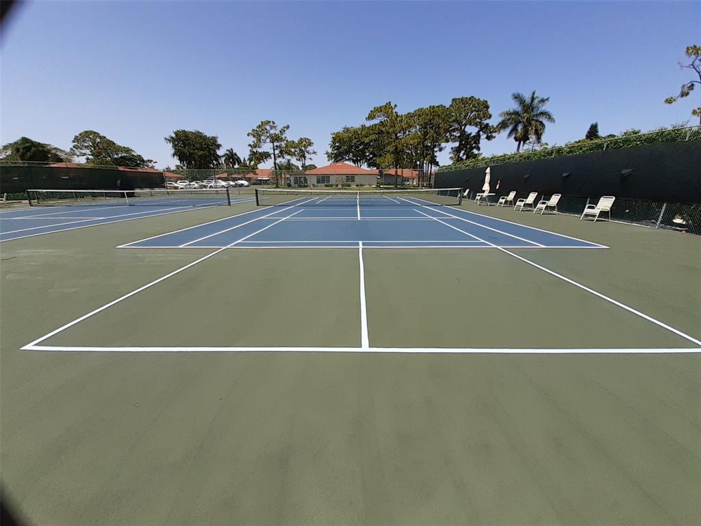 5245 Northwest 3rd Street, Unit D Delray Beach, FL 33445 - Photo 18 of 18 a view of a tennis court