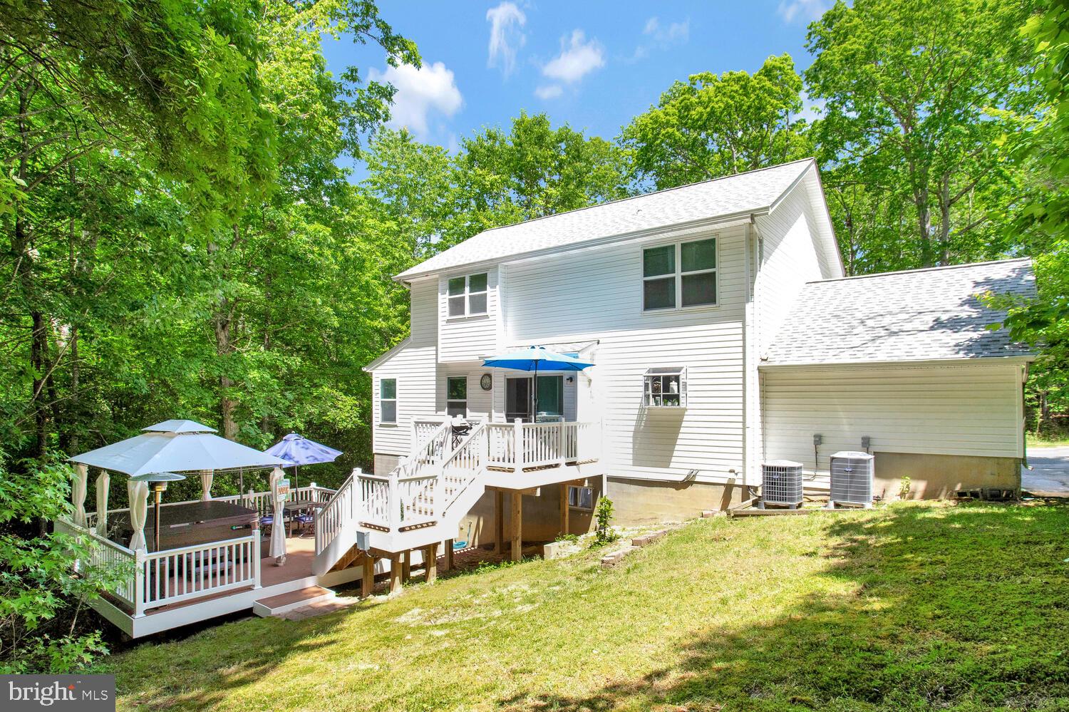 329 Red Cloud Road Lusby, MD 20657 - Photo 19 of 32 a view of a house with pool porch and furniture