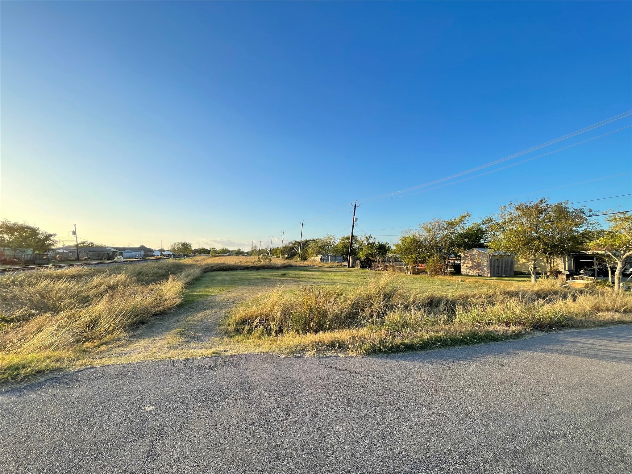 0 Ash Street Freeport, TX 77541 - Photo 4 of 9 a view of a lake with houses