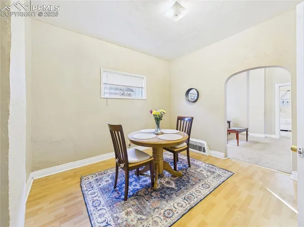a view of a dining room with furniture