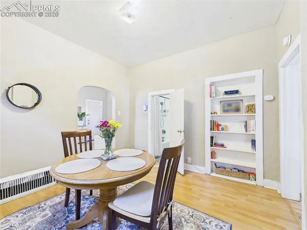 a view of a dining room with furniture