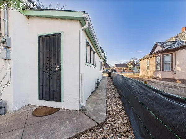 a view of a backyard with a patio